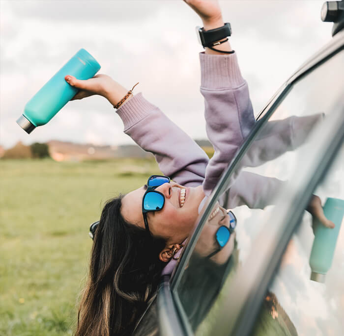 Woman on the go with drink mix